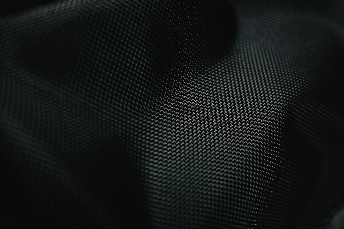 Close-up of a breathable black mesh fabric